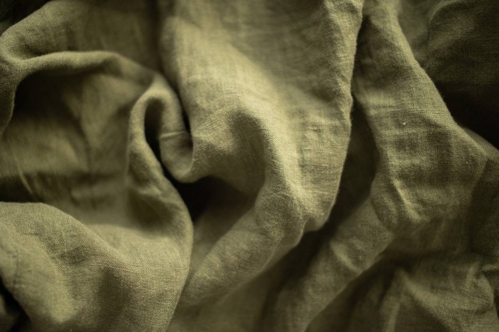 Crumpled green cloth - Darren Yaw's wife
